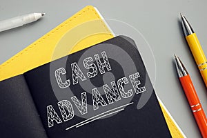 CASH ADVANCE sign on the sheet. AÂ cash advanceÂ is a short-term loan from a bank or an alternative lender